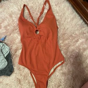 Super cute one piece sz large NWT‼️‼️